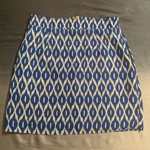 Blue and white mini skirts.